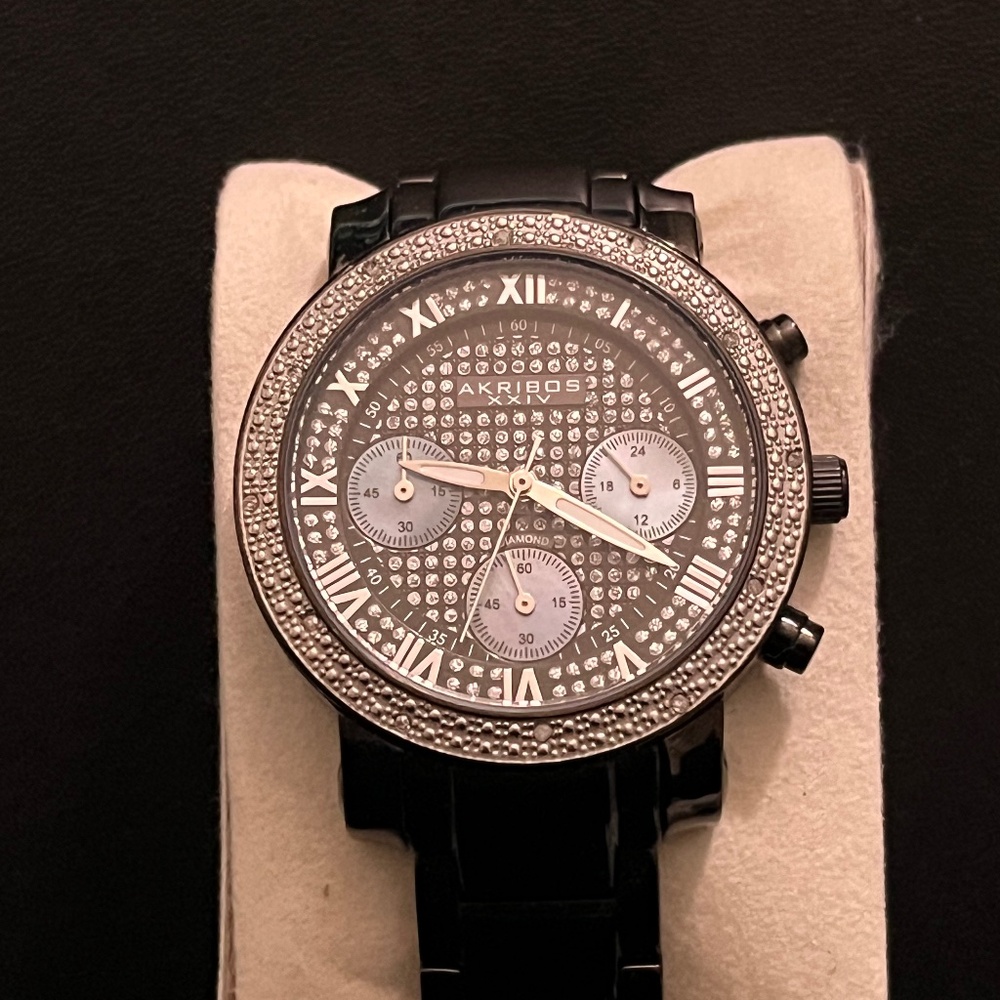 Women’s black Akribos watch